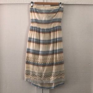 Strapless striped dress with tie in back.
